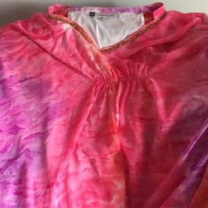 Jennifer Lopez very bright top